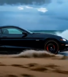 黑色跑车在海边行驶12598#横屏 