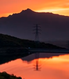 夕阳下山水与输电塔景观10166#横屏 