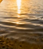 夕阳下水面与岸边石墩景观2477#横屏 