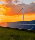 夕阳下的太阳能板与风力发电机11220#横屏 