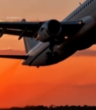  夕阳下客机起飞画面7636#竖屏 	 