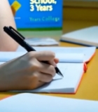  女学生伏案书写神情略显疲惫2317#竖屏 	 