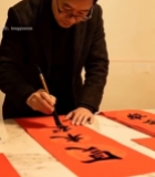  男子毛笔书写红色对联3945#竖屏 	 