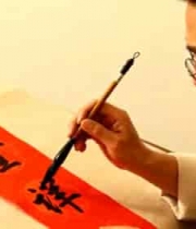  男子书写春节对联素材1282#横屏 	 