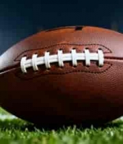  橄榄球置于绿茵场特写3019#横屏 	 -