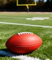  草地上的红色橄榄球1930#横屏 	 