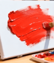 画板上用画笔涂抹红色颜料9867#横屏 