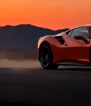 夕阳下公路上行驶的红色跑车2507#横屏 