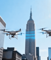 无人机于城市高楼间飞行12750#横屏 