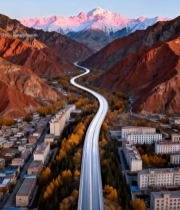  雪山下蜿蜒公路与城镇风光724#竖屏 	 