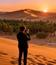  男子沙漠中拍摄日落景象5889#竖屏 	 