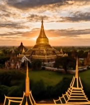  航拍日落时分的金色佛塔1527#竖屏 	 