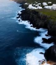  海岸边山坡白色房屋航拍339#竖屏 	 